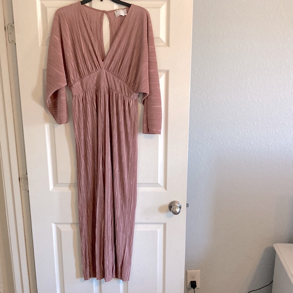 Beautiful and comfortable Low v neck line pant set romper.